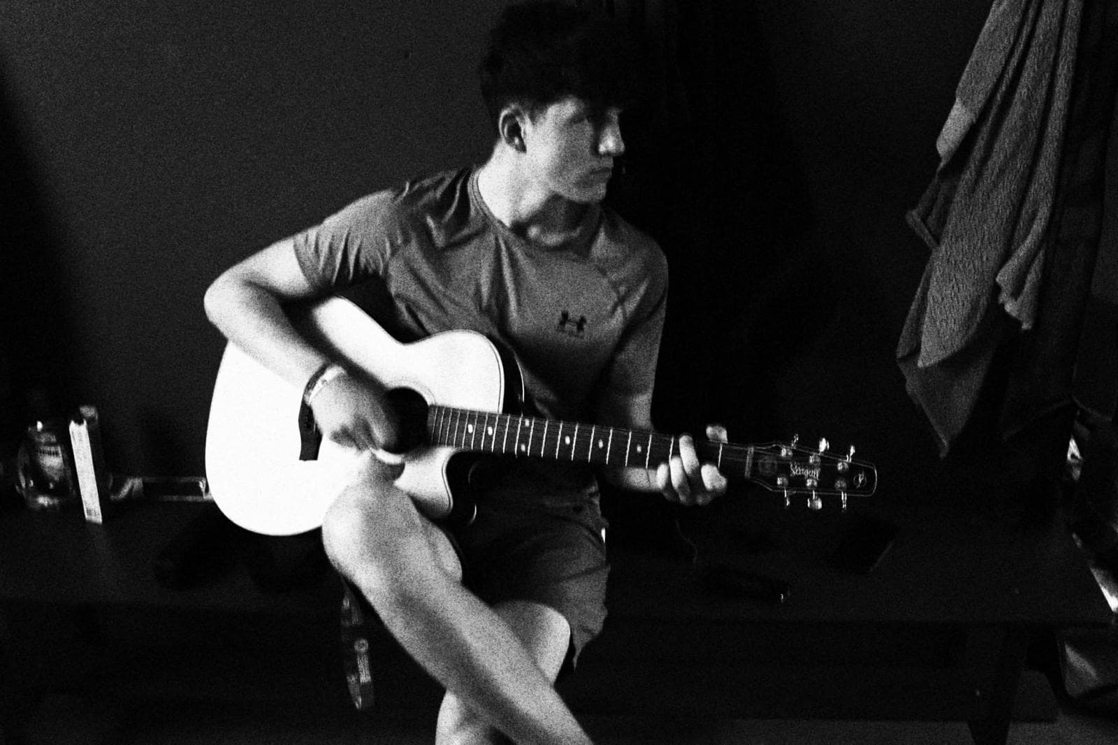 Tom Forkin with his guitar